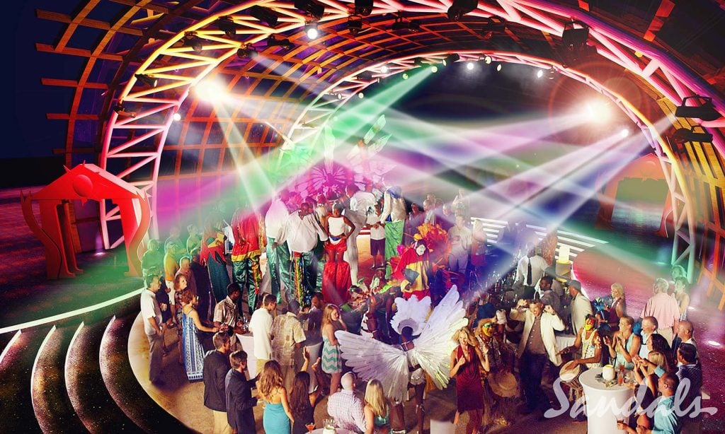 Sandals Ochi Resort night life, a themed party under colorful stage lights